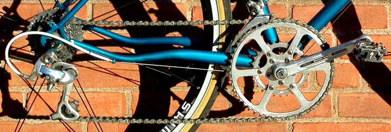 a wide-step system using a racing derailer